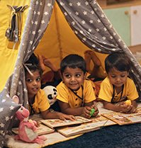 Students learning at National Model CBSE School